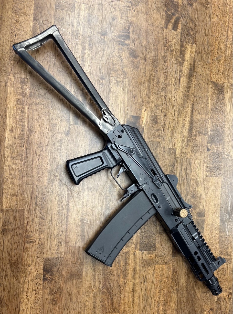 AGA 5.45K short-barrel custom AK in Armor Black with FX Silver distressed stock, built by Alpha Group Armory in Naples FL